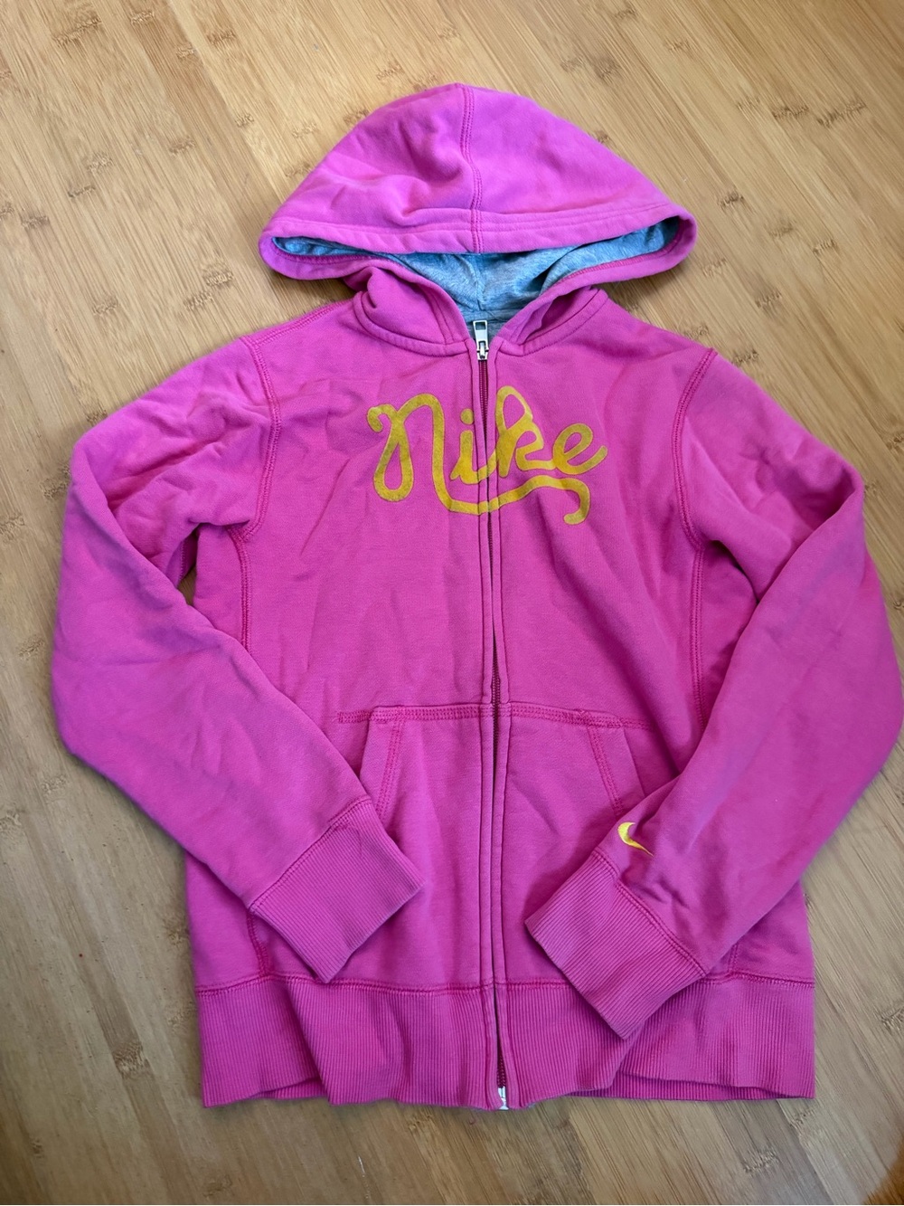 Nike Girls' Pink Zip-Up Hoodie with Gold Script Logo